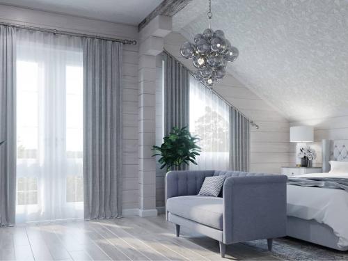 Спальня в деревянном доме на мансардном этаже 02