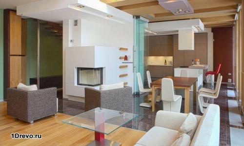 Интерьер кухни-гостиной в деревянном доме. Как организовать переход между кухней и гостиной