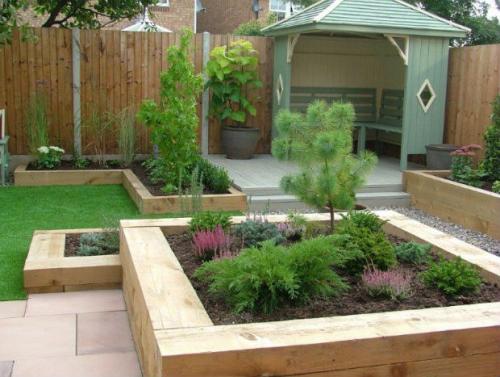 Забор для клумбы из дерева своими руками. Ограждение для клумб и грядок из дерева — красота с природным началом (более 70 фото)