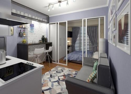 Маленькая квартирка — студия в сером цвете с выделенной спальной зоной 02