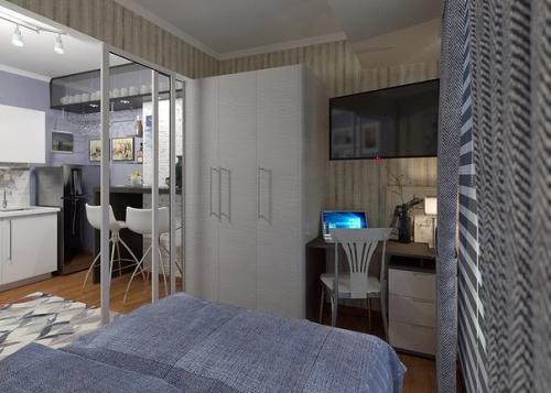 Маленькая квартирка — студия в сером цвете с выделенной спальной зоной 03