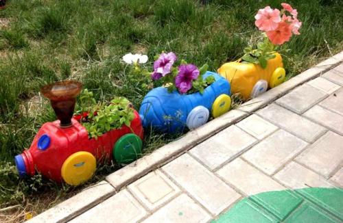 Клумбы из 5 литровых пластиковых бутылок. Клумба из бутылок: 130 фото примеров оформления участка при помощи пластиковой и стеклянной тары