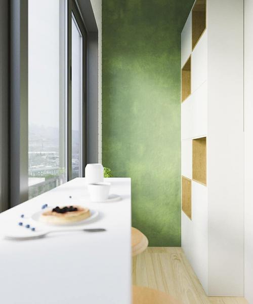 Оформление балкона насыщенным зеленым цветом 02