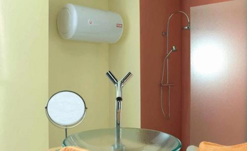 Устройство накопительного водонагревателя в разрезе. Устройство электрического накопительного водонагревателя 05