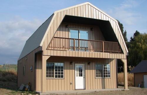 Пристройка к дому с ломаной крышей. Мансардная кровля