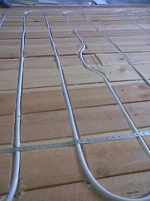 Улучшите комфорт в своем деревянном доме с водяным теплым полом 01