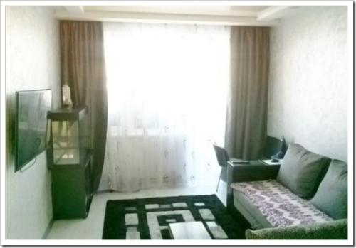 Как поставить угловой диван в прямоугольной комнате