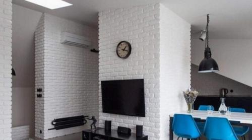 Отделка стен белым декоративным кирпичом. Белая кирпичная стена — к каким стилям внутренней отделки она подходит?