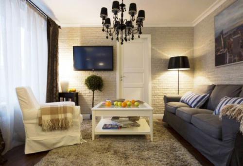 Отделка стен под белый кирпич. Белая кирпичная стена в гостиной