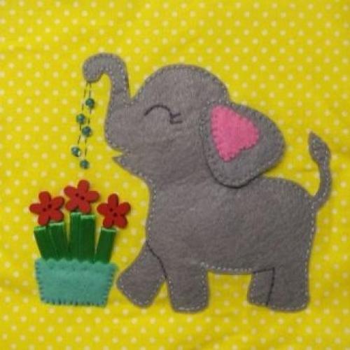 Как сделать поделки из ткани на новый год. Мягкие новогодние игрушки из ткани своими руками 22 Как сделать поделки из ткани на новый год. Мягкие новогодние игрушки из ткани своими руками 22