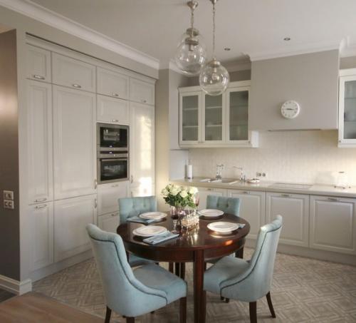 Белый стол и черные стулья. Как подбирать цвет обеденного стола?