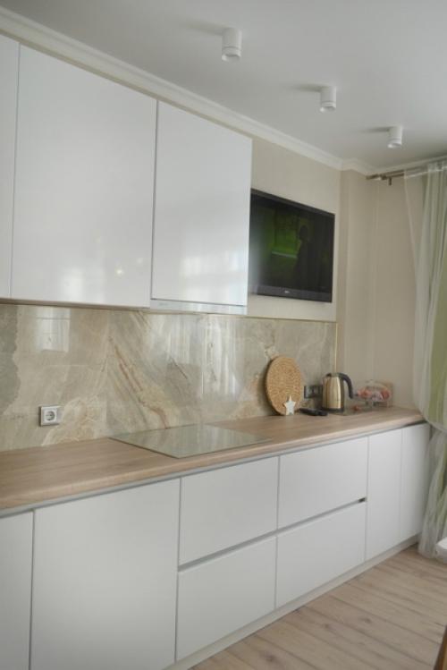 Очень симпатично.  Хочется задержаться на такой кухне. 01