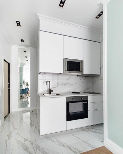 Интерьер квартиры - студии в пастельных тонах.