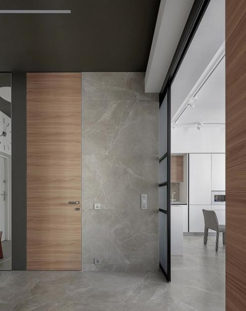 Убрав лишние перегородки квартира стала еще больше просторной и наполненной светом. 02