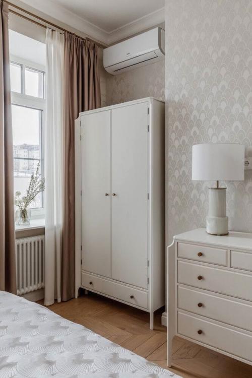 Просторная квартира в дореволюционном доме обрела новое лицо, сохранив свою историю. 07