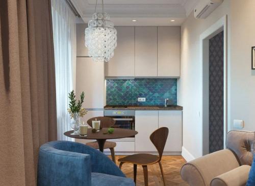 Дизайнеры разместили на 38 квадратах компактную кухню, обеденную зону, гостиную, спальню и санузел. 01