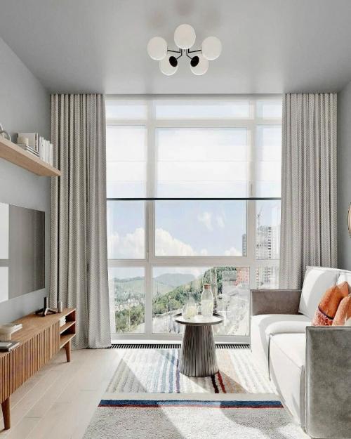 Небольшая студия с мягкой цветовой палитрой. 07