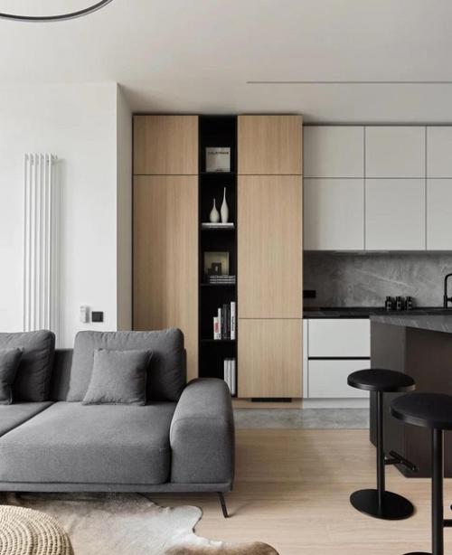 Интерьер квартиры в спокойных серых тонах.