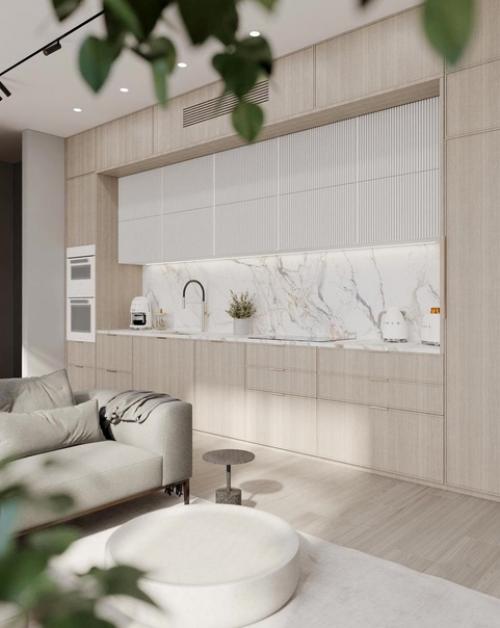 Современная кухня, которую объединили с гостиной.