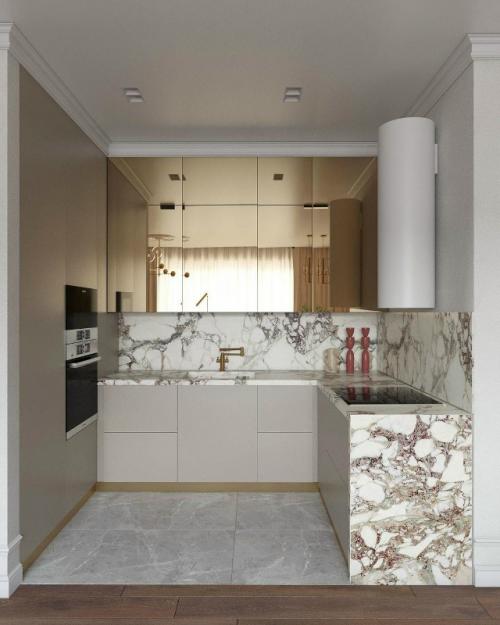 Эстетичный интерьер небольшой кухни - гостиной, где каждая деталь работает на ощущение роскоши и уюта одновременно. 

