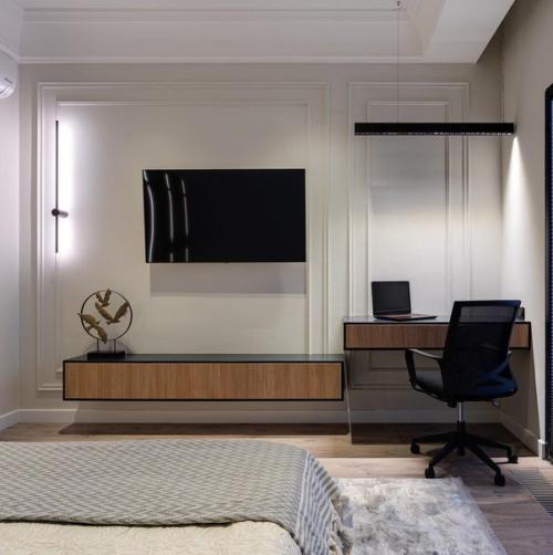 Мягкий, уютный дизайн спальной комнаты.