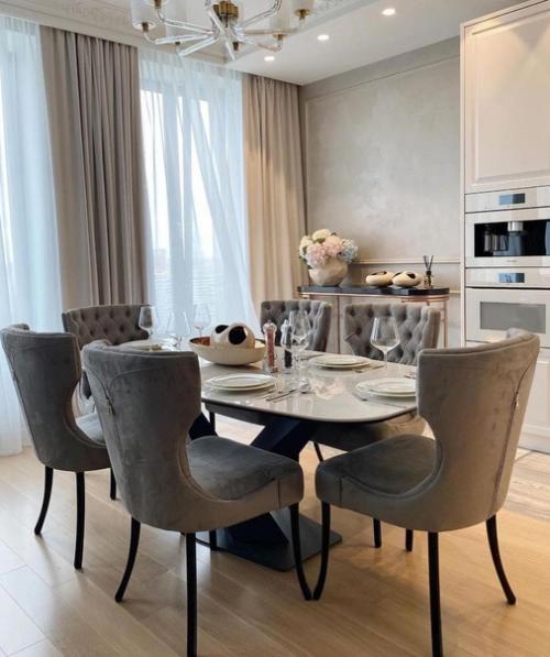 Стильная, элегантная кухня объединенная с гостиной. 

