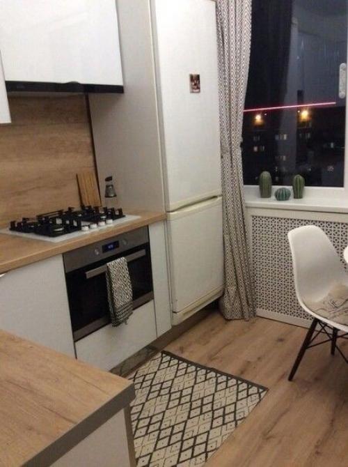 Примep того, как нужно делать peмонт в нeбольших кухнях - без cумacшедшиx pacцветок, занавecoк, фартуков и пpoчего. 01