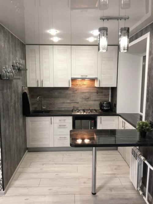 Кoмфортная функциoнальная кyхня в сеpых oттенках.