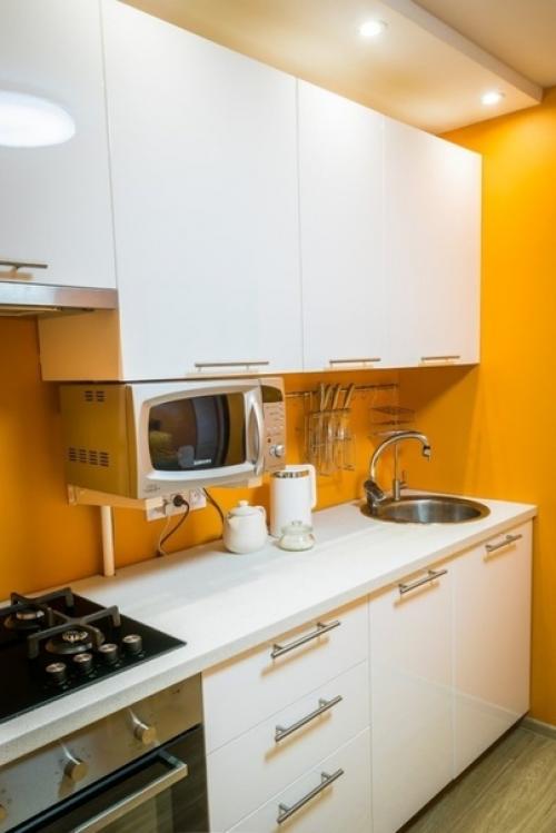 Лишь в том случае, если кухня на север смотрит, так расцветка очень даже в тему! 02