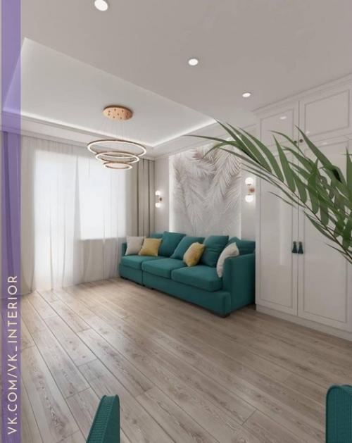 А вы бы стали добавлять еще мебель или декор в интерьер этой гостиной. 01