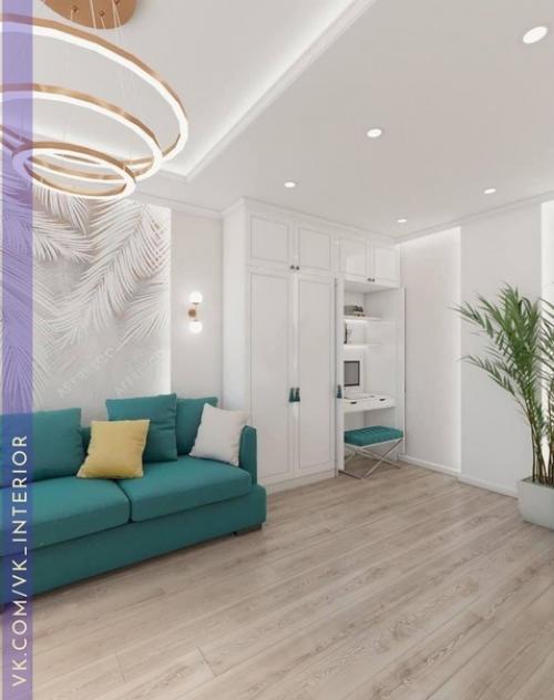 А вы бы стали добавлять еще мебель или декор в интерьер этой гостиной.