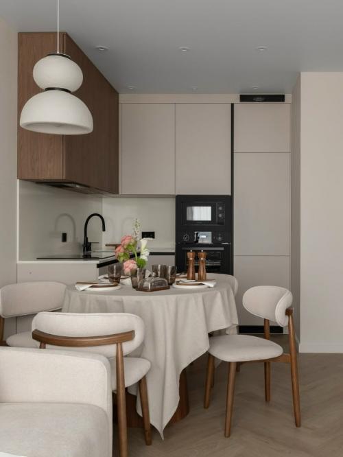 Тёплый интерьер небольшой квартиры с акцентом на тёмное дерево. 06