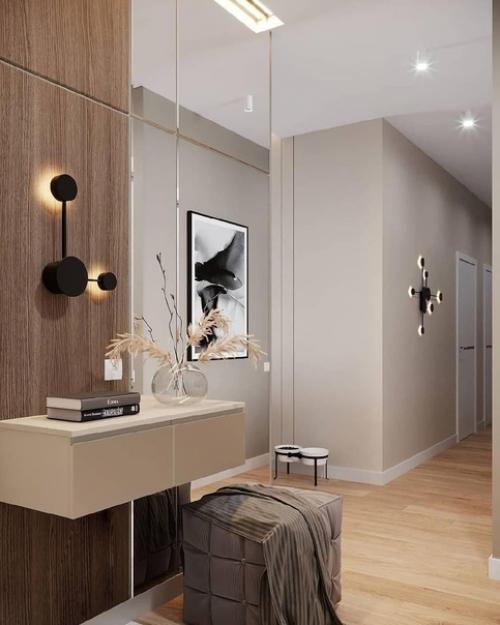 Прихожая с бежевыми обоями или штукатуркой в стиле минимализм будет смотреться стильно, уютно.