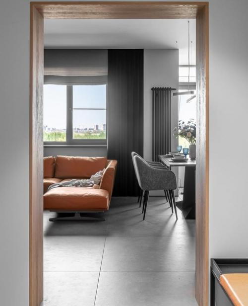 Современный интерьер квартиры в серых тонах с оранжевыми акцентами. 03